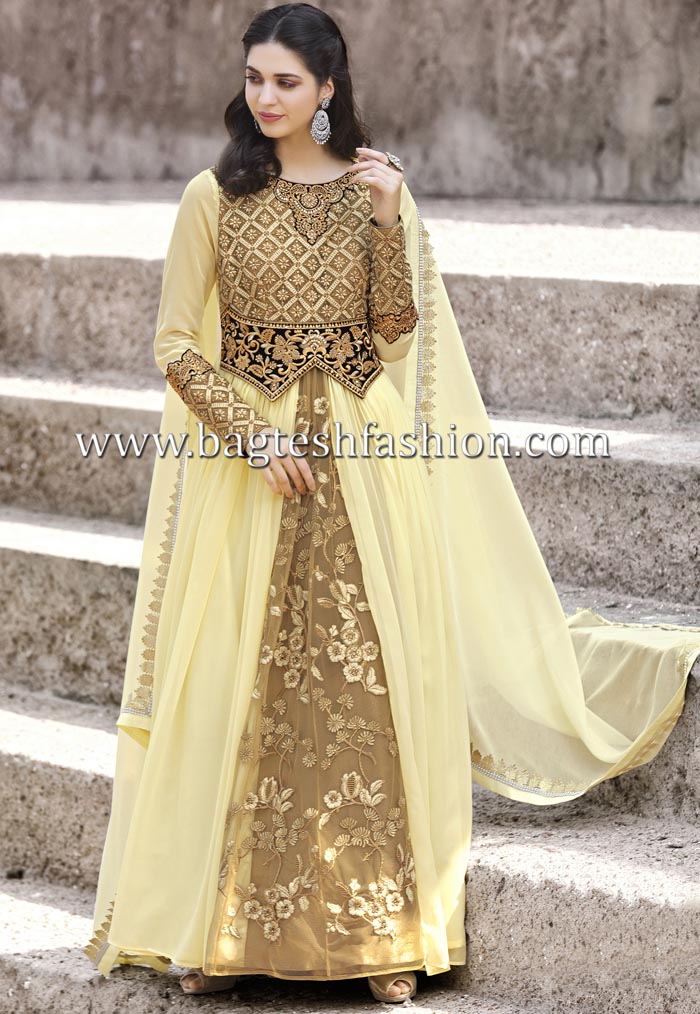 Stylish Cream And Green Georgette Suit